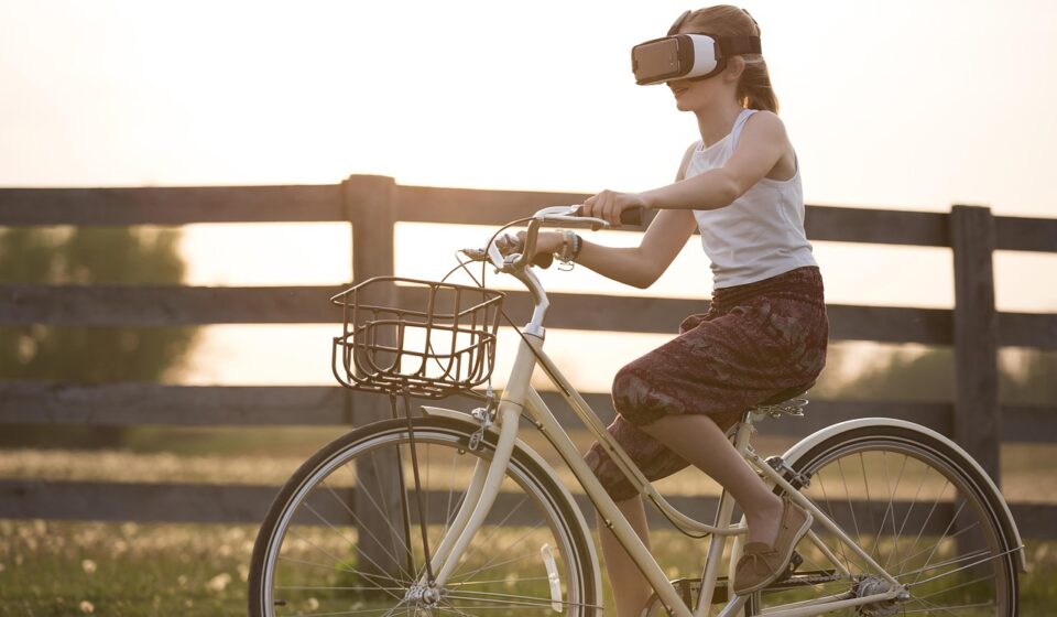augmented reality, bicycle, girl, bike, child, cyclist, metaverse, fence, fun, outdoors, person, virtual reality, virtual reality glasses, virtual reality goggles, virtual reality headset, vr headset