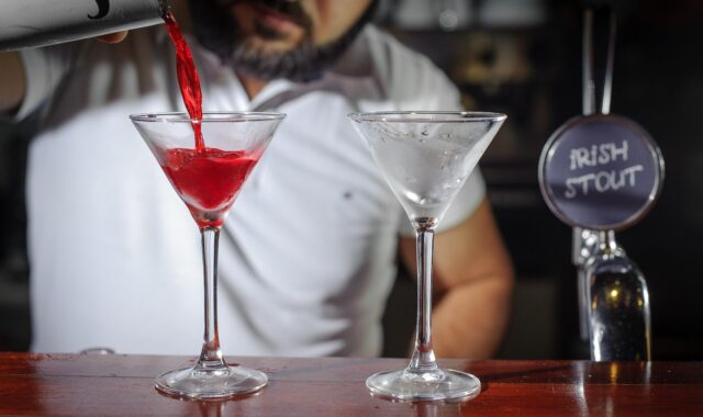 bartender, bar, glass, martini, juice, cocktail, shaker, pours, preparation, red, drink, table, bar counter, two, capacity, serving, bartender, bartender, bartender, bartender, bartender, martini