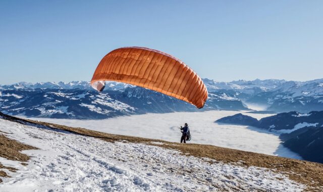 paraglider, flying, paragliding, freedom, leisure time, activity, sea of fog, snow, flight, nature, preparation, flight weather, mountain landscape, winter, panoramic views